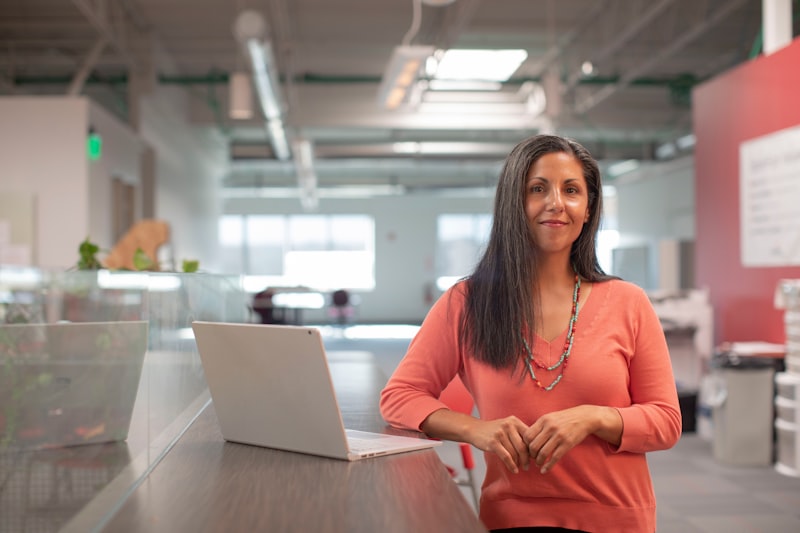 Ecommerce founder packing her first customer orders at home